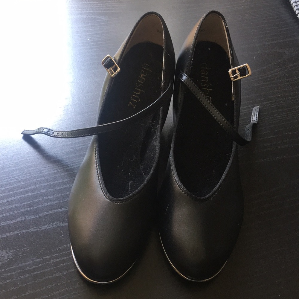Black tap shoes with a little heel